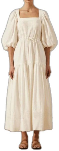 White Voluminous Skirt Dresses, White Voluminous Dress, White Knee-length Dress With Voluminous Skirt, White Midi Dress With Voluminous Skirt, White Pleated Tiered Dress, White Pleated Dress With Tiered Skirt, White Voluminous Midi Dress For Spring, White Dress With Puff Sleeves And Voluminous Skirt, White Midi Dress With Voluminous Skirt For Spring