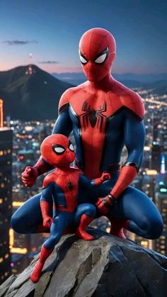 spider - man and his baby are posed on top of a building in the city