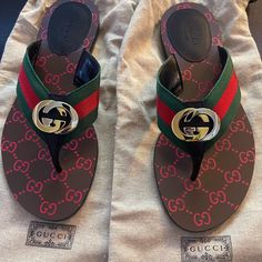 Gucci Women’s Gg Thong Web Sandals. Size 7. Brand New In Original Packaging. Perfect Condition. Paid $600. Designer Flat Flip Flops For Beach, Gucci Designer Flat Sandals, Red Gucci Sandals For The Beach, Designer Open Toe Flip Flops For Vacation, Luxury Flip Flops, Gucci Women, Shoes Gucci, Gucci Shoes, Women's Shoes Sandals