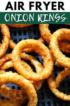 some onion rings are sitting on a grill with the words air fryer onion rings