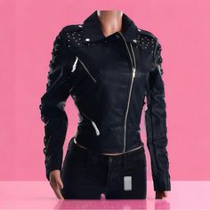 Women’s Members Only Faux Leather Biker Jacket-Black This Women’s Studded Vegan Leather Jacket Features A Signature Moto Jacket Fit With Studs On The Shoulder And Stitching Detail Of Braid Lacing Up The Sleeves. Fold Over Collar Asymmetrical Zip Closure 20″ Length Front Zip Closure Notched Collar Long Sleeves Chest And Side Zip Pockets Lined 100% Polyurethane Spot Clean Imported True To Size Leather Rocker Biker Jacket With Zipper Closure, Fitted Studded Edgy Biker Jacket, Leather Jacket Runway, Luxury Leather Biker Jacket With Metal Zipper, Black Studded Biker Leather Jacket, Black Biker Leather Jacket With Metal Zipper, Members Only Jacket, Suede Biker, Suede Biker Jacket