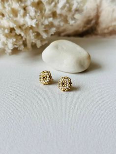 Make your everyday outfit more shiny wearing these white/ gold beaded post earrings. These statement stud earrings are made from Miyuki Delica seed beads and supplied with stainless steel accessories. So lightweight and comfortable to wear, these dainty beaded studs would be the perfect adornment for holiday look. If you're looking for delicate seed bead earrings for wedding, this pair is a great finding for you. Also, these minimalist earrings are making a great Christmas gift for bohemian jewe Gold Festive Earrings With Tiny Beads, Festive Gold Earrings With Tiny Beads, Gold Earrings With Tiny Beads For Gifts, Gold Studs Jewelry Gift, Gold Studs Jewelry For Gift, Gold Stud Jewelry For Gifts, Gold Dainty Earrings With Tiny Beads, Dainty Gold Earrings With Tiny Beads, Dainty Gold Beaded Earrings