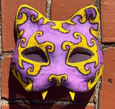 Looking for the perfect cat mask to complete your Therian or quadrobics look? Look no further than our handmade cat mask! Perfect for quadrobics, cosplay, anime, and Halloween costumes. Each mask is 100% handmade with high-quality felt, paint, fur, and foam. It takes 4 hours to create each mask, ensuring attention to detail and durability. With a one-size-fits-most design, this mask is sure to be a hit with therians and quadrobists of all ages. Halloween Masquerade Mask With Cat Design, Halloween Cosplay Cat Design Mask, Cat Design Eye Mask For Cosplay, Cosplay Cat Design Eye Mask, Cosplay Cat Design Mask, Therian Mask, Cat Mask, Yellow Cat, Costume Mask