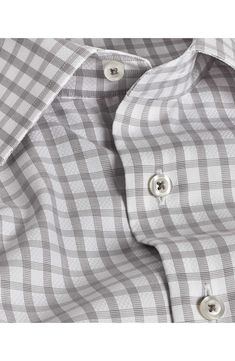 A classic check pattern smartens the look of this versatile dress shirt made from cool and comfortable cotton with adjustable button cuffs. 31 1/2" length Spread collar Rounded, adjustable button cuffs 100% cotton Machine wash, line dry Imported Formal Plaid Button-up Shirt, Business Casual Plaid Button-up Dress Shirt, Business Plaid Shirt With Spread Collar, Formal Gingham Button-up Shirt, Plaid Spread Collar Shirt For Business Casual, Business Casual Plaid Shirt With Spread Collar, Classic Gingham Dress Shirt For Business, Elegant Plaid Formal Shirt, Elegant Plaid Shirt For Business Casual