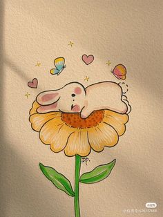 a drawing of an elephant sleeping on top of a yellow flower with butterflies flying around