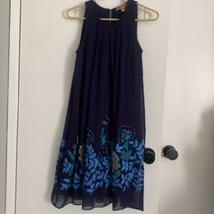 This Is A Brand New Beautifully Embroidered Chiffon Dress From Anthropologie. Navy Blue. Size 2. Approximate Measurement: Shoulder: 10 Inches Chest: 18 Inches Hem Width: 33 Inches Shoulder-Hem Length: 38 Inches Casual Sleeveless Embroidered Midi Dress, Blue A-line Midi Dress With Floral Embroidery, Blue A-line Sleeveless Dress For Vacation, Casual Blue Embroidered Midi Dress, Blue Sleeveless Knee-length Dress For Casual Occasions, Blue Sleeveless Casual Dress, Blue Sleeveless Dress Down Day Outfit, Blue Sundress For Casual Occasions, Sleeveless Floral Embroidered Midi Dress For Vacation