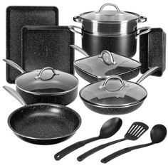 an assortment of black pots and pans