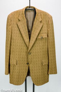 This wonderful true vintage 70's sport coat is fully lined and has a gold/brown square pattern, with a great patterned lining. It has 2 lower flap pockets, and 1 breast pocket outside, and 3 pockets inside. Metal crested buttons. The details on the coat give it the look of an English sack suit, that along with the color and pattern, make it a perfect Steampunk coat. Excellent vintage condition. Size 42/44 Suggested cleaning-Dry Clean Sack Suit, Steampunk Coat, Brown Square, Square Pattern, Dr Who, Sport Coat, True Vintage, Flap Pocket, Brown Gold