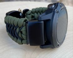 "FREE USPS PRIORITY MAIL SHIPPING FOR DOMESTIC US ORDERS (Includes U.S. Military APO/FPO Address Overseas) Thank you for visiting our shop \"Cording 2U\". A veteran owned business. Handcrafted Paracord wearables customized \"According To You\". Handcrafted with 100% Nylon Paracord \"MADE IN USA\" Our Products include: 🔹Custom handcrafted watch bands according to your wrist size, style, and color of choice. If you don't see it in our page yet, please contact us and we can discuss your options. ? Adjustable Watch Accessories With Analog Display For Outdoor, Functional Green Watch Accessories For Outdoor, Functional Green Outdoor Watch Accessories, Durable Green Watch Bands For Outdoor, Paracord Watchband, Garmin Marq, Paracord Watch, Paracord Armband, Handmade Watch Bands