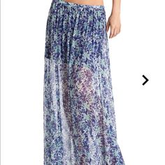 Style: #P21d2202000 Capture Two Of-The-Moment Trends In This Floral Maxi Skirt. Its Chic Length And Eye-Catching Pattern Keep Your Style Current And Ready For Summer. Maxi Skirt Sheer Floral Pattern Miniskirt Length Lining Hidden Zipper Closure At Side Measures 40” Length From Waist To Hem 100% Viscose. Lining: 96% Polyester, 4% Spandex. Dry Clean Note: Tags Have Been Cut Through To Prevent Store Returns Blue Summer Skirt With Elastic Waistband, Blue Maxi Skirt With Elastic Waistband For Vacation, Blue Spring Maxi Skirt, Blue Maxi Skirt For Spring And Summer, Blue Flowy Maxi Skirt For Day Out, Chic Blue Maxi Skirt With Floral Print, Blue Lined Maxi Skirt For Day Out, Blue Floral Print Maxi Skirt For The Beach, Spring Blue Flowy Maxi Skirt