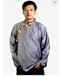 TRADITIONAL TIBETAN SHIRT  This unique style is derived from the clothing Tibetans usually wear to cultural events. 100% Cotton this unique shirt is loose and comfortable perfect for summer and spring.  Made by hand, this texture is coarser than normal cotton, however, customers have boasted about the durability of this shirt lasting them 20 years. Men and Women can both wear these incredibly light and soft shirts to break away from the tight clothing we are used to. Cotton is the perfect materi Traditional Tops With Traditional Patterns For Festivals, Traditional Tops With Festive Patterns, Traditional Cotton Top With Stand Collar, Traditional Ceremonial Tops For Festivals, Traditional Long Sleeve Shirt, Traditional Tops For Puja And Transitional Seasons, Traditional Long Sleeve Shirt With Patterns, Casual Long Sleeve Top With Traditional Patterns, Traditional Long Sleeve Tops For Festival