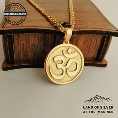 Welcome to our Etsy shop, where we offer an exquisite Om Necklace that you can customize to make it truly unique to you or your loved one.  Our Om Necklace features a beautiful Om pendant that serves as a powerful symbol of peace, harmony, and spiritual enlightenment. This Yoga and Meditation Jewelry piece is a must-have for anyone who practices yoga, meditation, or any other spiritual practice.  The Buddhist Om Necklace is designed to remind you of your inner peace and tranquility, making it th Spiritual Medallion Jewelry For Anniversary, Symbolic Brass Jewelry For Anniversary, Personalized Silver Brass Jewelry, Spiritual Engraved Round Jewelry, Customized Silver Medallion Jewelry, Symbolic Nickel-free Jewelry For Anniversary, Handmade Spiritual Jewelry For Anniversary, Spiritual Engraved Jewelry As Gift, Personalized Spiritual Brass Jewelry