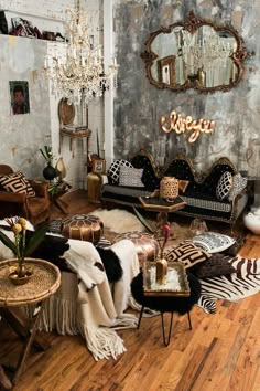 a living room filled with lots of furniture and decor