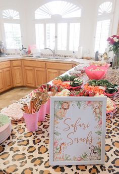 a long table with food on it in a kitchen