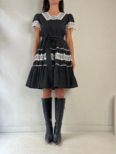 "- Vintage handmade black polka dot puff sleeve dress - Zipper up the back - Lace trim - No tags - Small  Bust: 17.5\" Waist: 14\" Length: 38\"" Vintage Polka Dot Mini Dress, Vintage Mini Dress In Polka Dot, Fitted Swiss Dot Dress With Puff Sleeves, Fitted Swiss Dot Knee-length Dresses, Fitted Knee-length Dresses With Swiss Dot, Fitted Knee-length Swiss Dot Dresses, Black Ruffled Retro Dress, Retro Fitted Swiss Dot Dress, Fitted Retro Swiss Dot Dress