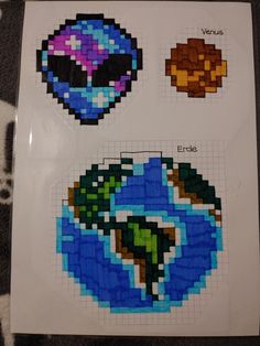 the cross stitch pattern is designed to look like an earth and four different types of planets