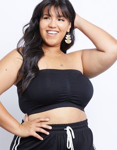 The Curve Padded Bandeau is a basic staple you need all year round. This bandeau is made from a very stretchy knit material and is padded. This bandeau is very comfy and it does not snatch or tug like a regular bra. It is perfect for wearing underneath a strapless dress, off the shoulder top, tube top, or blouse. Model is 5'7", bust 45", waist 36", hips 47". Materials and careThis bandeau is made from 90% nylon and 10% spandex. Hand wash cold. Imported Plus Size Micro Tube Top, Plus Size Bandeau Swimsuit, Plus Size Flat Chested, Nude Plus Size, Body References, Lounge Outfits, White Bandeau, Bandeau Bra, Top Pants Set