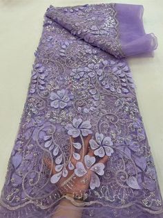 Purple Latest Nigerian Lace Fabrics Bead sequins Fabrics For Wedding 5Yards is_customized: Yes Width: 120cm to 130cm Which countries use: United States, Britain, Canada, France,Nigeria,Ghana,Ireland,United Kingdom,ect Ues: Fashion occasion women wedding dress,party,evening,show,clothes ect Type: beads lace Technics: Embroidered Suitable age: Unlimited Size: 5 yards one piece Set Type: NO Product Type: Lace Occasion: Wedding Occasion: Wedding Material: 100% Polyester MOQ: 5yards/pieces Feature: E Purple Embroidered Fabric For Wedding, Purple Sequined Tulle Fabric For Wedding, Women Wedding Dress, One Piece & Sets, Nigerian Lace, Lace Fabrics, Net Lace, Womens Wedding Dresses, 3d Embroidery