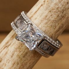 an engagement ring set with a princess cut diamond