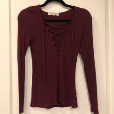 Nwot Lace Up Rib Knit Top. Cranberry/ Burgundy Color. Never Worn. Burgundy Knit Crew Neck Top, Casual Burgundy Knit Top, Fitted Burgundy Knit Tops, Red Long Sleeve Top From Urban Outfitters, Urban Outfitters Red Long Sleeve Top, Urban Outfitters Purple Long Sleeve Tops, Urban Outfitters Long Sleeve Purple Tops, Urban Outfitters Purple V-neck Top, Rib Knit Top