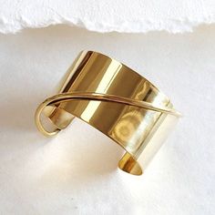 "2.5\" Wide cuff bangle bracelet handcrafted solid brass. High quality Logo Engraved Solid Brass Adjustable Arrives in logo drawstring protective pouch" Wire Cuff, Quality Logo, Cuff Bangle Bracelet, In Logo, Minimal Modern, Wide Cuff, Cuff Bangles, Bangle Bracelet, Cuff Bracelet