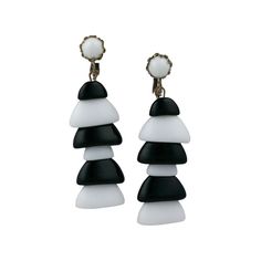 Miriam Haskell striking black and white pate de verre glass caps form the alternating pagoda form of these earrings...set in silvered metal. They measure 2.5" x .75".
 Excellent condition
 Adjustable clip back. Miriam Haskell Earrings, Miriam Haskell Jewelry, Black Moonstone, Miriam Haskell, Moonstone Earrings, Designer Fashion Jewelry, White Earrings, Gold Earrings Dangle, Gold Drop Earrings