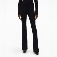 The Helmut Lang Flare Pant Is Slim-Cut, Feminine Silhouette Crafted With A Ribbed Stretch Knit. Details - 98% Polyamide, 2% Elastane - High Rise - Pull-On, Logo Elastic Waistband - Flare Leg - Imported - L07hw204 Care - Professional Dry Clean Only Fit - Fits True To Size - Naki Is 5’ 11” And Wears A Size S Stretch Full-length Yoga Pants With Contoured Waistband, Black Stretch Full-length Legwear, Black Stretch Full-length Flares, Non-stretch Flared Hem Pants, Helmut Lang Women, Pants Large, Silhouette Crafts, Helmut Lang, Flare Pants