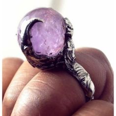 This One Of A Kind Ring Was Crafted From A Little Sphere Shaped #Amethyst #Crystalball #Gemstone That Gives Off Some Nice Facets And Inclusions Depending On The Lighting And Angle. The Stone Has Been Soldered With Lead Free, #Silver Bearing Solder To An Fixed Ring Base. This Ominous Beauty Definitely Looks Like What A Fantasy, Vampire Or Monster Lover Would Wear. Love The Gothic Detail And Clarity Of The #Crystal . Amazing Design And Stone. Goes With With Any Outfit Or As A One Of A Kind Gift. Adjustable Size 6-12 Can Be Made Into A Fixed Size Upon Request. Please Contact Me With Any Questions. Vampire Rings, Fantasy Vampire, Vampire Ring, Monster Lover, Crystal Ball Ring, The Gothic, Amethyst Ring, Amethyst Crystal, Crystal Ball