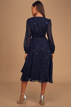 Classy and chic come together in perfect harmony to create the Lulus Evening of Elegance Navy Blue Floral Jacquard Wrap Midi Dress! Lightweight woven fabric, with a floral jacquard pattern, shapes this fabulous dress that has a surplice neckline and sheer long sleeves with button cuffs. Adjustable wrap silhouette, with tying waist sash and hidden internal ties, ends at a slightly ruffled midi hem. Fit: This garment fits true to size. Length: Mid-calf length. Size medium measures 47" from shoulde Chic Jacquard Dresses For Weddings, Elegant Knee-length Jacquard Dresses, Elegant Spring Jacquard Midi Dress, Elegant Jacquard Midi Dress For Spring, Elegant Jacquard Midi Dress For Formal Events, Elegant Jacquard Midi Dress, Elegant Formal Jacquard Midi Dress, Chic Jacquard Dress For Formal Occasions, Elegant Jacquard Midi Dress With Floral Print