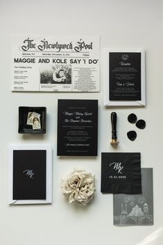 the wedding stationery is laid out neatly