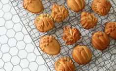 some cookies are cooling on a wire rack