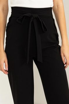 Look no further for a sizzling new look – our "Chic Flair" Cinched Tie Flared Pants are your answer to elevated style. With a high-rise silhouette and a cinched tie waist, these pants boast a fusion of fashion and function that embraces your curves in a flattering, hip-hugging fit. The flared-cut legs add a timeless trendy touch that remains in vogue throughout the seasons, making these pants a versatile addition to your fashion repertoire. Designed for casual elegance, the solid print and tie f Trendy Tie Waist Workwear Bottoms, Trendy Workwear Bottoms With Tie Waist, High Waist Bottoms With Tie Waist In Solid Color, High Waist Solid Bottoms With Tie Waist, Solid High Waist Bottoms With Tie Waist, Solid Color High Waist Bottoms With Tie Waist, Versatile Solid Bottoms With Tie Waist, Trendy High Waist Wide Leg Pants For Date Night, High Waist Bottoms With Belt Loops For Night Out