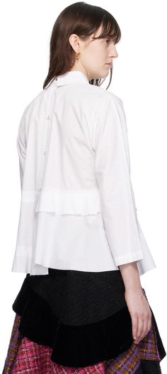 Cotton poplin blouse. · Peter Pan collar · Raw edges at tiered peplum hem · Asymmetric hem · Button closure at back Supplier color: White White Peplum Tops, Tiered Blouse, Poplin Blouse, White Peplum, Layered Blouse, Blouse Price, Peplum Blouse, Peplum Hem, Hem Style