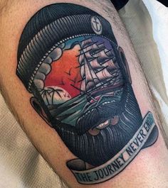 a man's leg with a tattoo on it that says the journey never ends