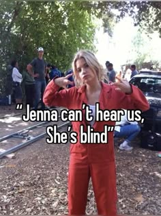 a woman standing in front of a car with the caption, jenny can't hear us she's blind