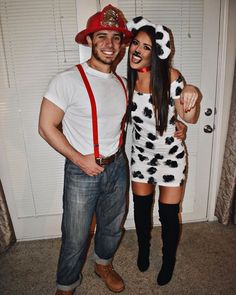 a man and woman dressed up in costumes