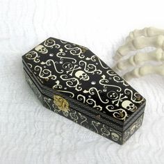 a black and white box with skulls on it