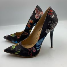 Very Sweet Butterfly Pumps. Black Cloth Uppers Are Decorated With Sweet Images Of All Sorts Of Butterflies. Shoes Are Brand New And In Perfect Condition. 4.5" Heel. Tiny Nick In Foot Bed Of Left Shoe. P-141 Chic Black Fabric Heels, Black Floral Print Heels With Pointed Toe, Black Floral Print High Heels, Black Floral Print Heels For Evening, Black Floral Print Evening Heels, Chic Fabric Heels With Floral Print, Black Floral Print Heels For Formal Occasions, Chic Floral Print Fabric Heels, Formal Black Heels With Floral Print