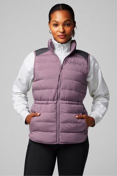 Essential Puffer Vest Fabletics purple female Activewear >> Womens >> Jackets & Outerwear >> Jackets regular Everyday Water-Repellent Winter Nylon Outerwear For Workout, Winter Nylon Activewear, Purple Outdoor Outerwear For Spring, Purple Athleisure Activewear For Fall, Winter Sports Activewear In Purple, Purple Athleisure Outerwear For Outdoor, Versatile Winter Activewear For Outdoor Activities, Winter Sports Outerwear In Purple, Purple Winter Sports Outerwear