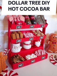 the dollar tree diy hot cocoa bar is on display in front of candy canes