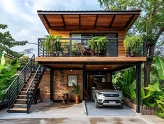 a car is parked in front of a house with plants on the roof and stairs