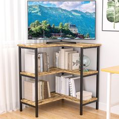 an entertainment center with bookshelves and a flat screen tv