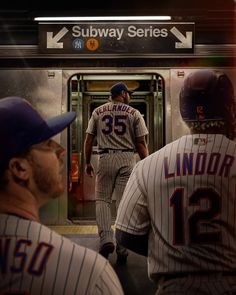 the baseball players are waiting for the subway train