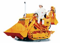 a man sitting on top of a yellow bulldozer in front of a white background