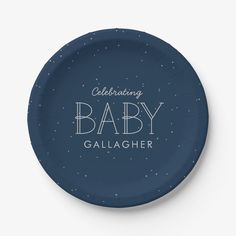 a blue paper plate with the words celebrating baby on it's side and stars in the background