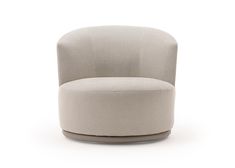 an upholstered chair with a circular seat and foot rest on the bottom half of it