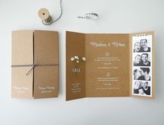 an open brown wedding card with pictures on it and a string attached to the back