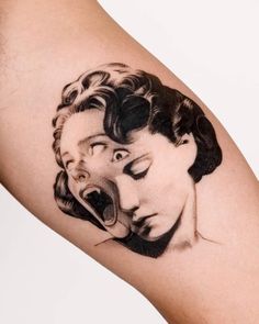 a woman's arm with a black and white portrait on it