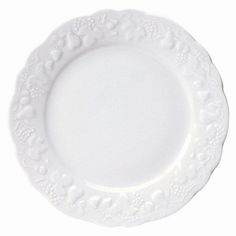 an empty white plate on a white background