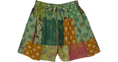 Savanna Green Mixed Prints Patchwork Cotton Shorts in Shorts - An ethnic floral printed mixed patchwork cotton shorts in savanna green. Features: Patchwork, Printed, Bohemian, Handmade. Bohemian Multicolor Spring Shorts, Green Patchwork Bottoms For Summer, Summer Green Patchwork Bottoms, Green Bohemian Shorts For Summer, Bohemian Green Shorts For Beach, Bohemian Summer Bottoms With Floral Patchwork, Green Summer Festival Shorts, Bohemian Green Shorts For Vacation, Cotton Hippie Shorts